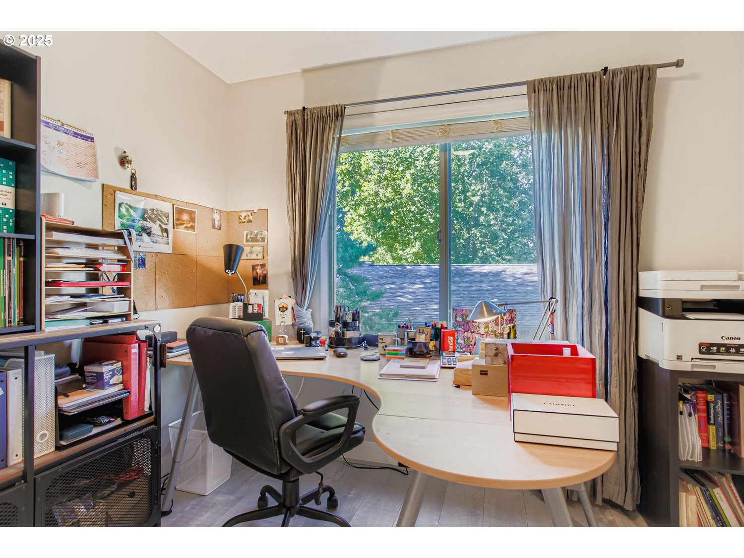 12119 Southwest Tesla Terrace Beaverton, OR 97008 - Photo 21 of 31 a room with furniture and a window