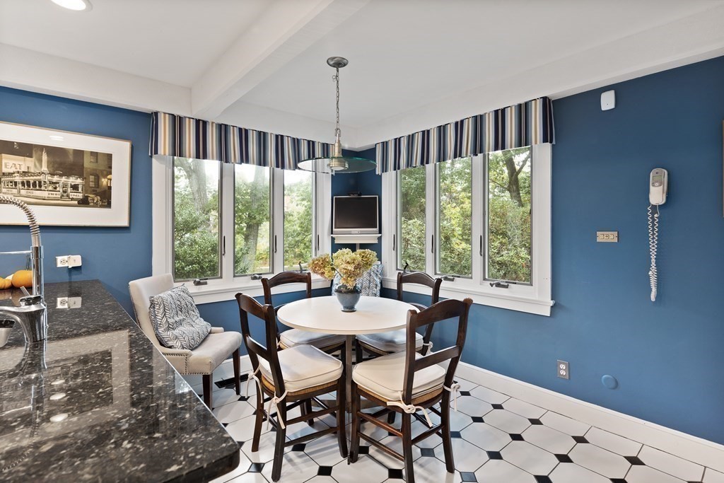 61 Cliff Road Weston, MA 02493 - Photo 11 of 28 a view of a dining room with furniture window and outside view