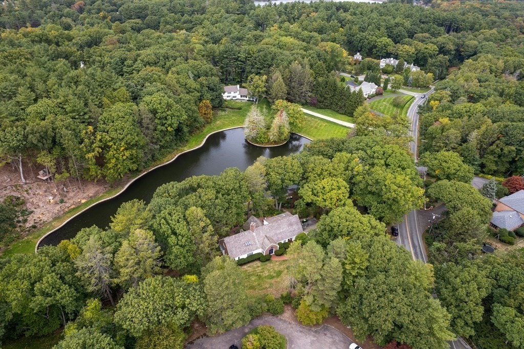 61 Cliff Road Weston, MA 02493 - Photo 3 of 28 a view of a lake with a houses
