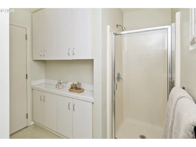 a bathroom with a sink and mirror