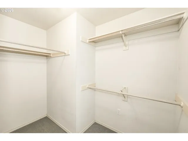 a view of balcony with mountain and wooden fence