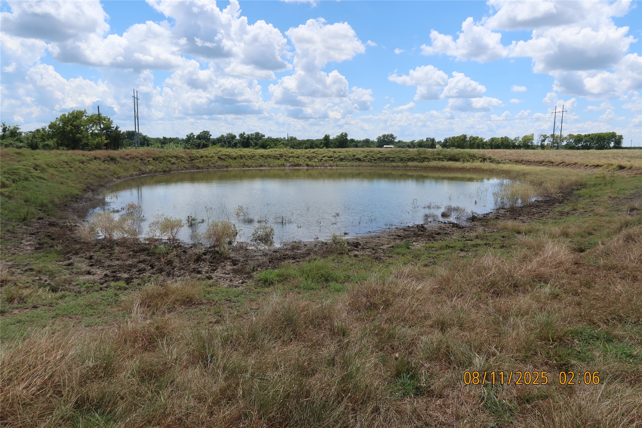 0 Sempronius Road Chappell Hill, TX 77426 - Photo 20 of 25 a view of a lake with houses in the back