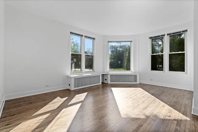 a view of a room with a large window