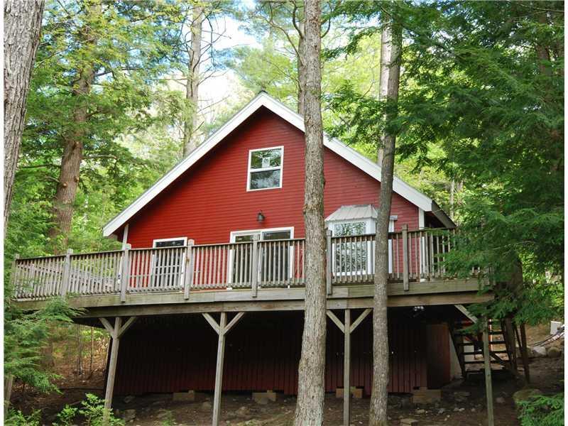 67 Coffee Pond Road Casco, ME 04015 - Photo 1 of 12 Exterior Front. Water side of cottage