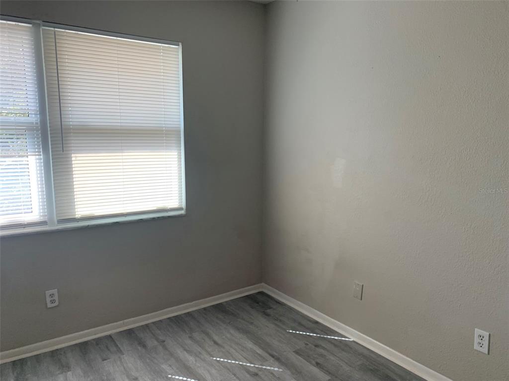 3756 Amherst Way, Unit 1 Sarasota, FL 34232 - Photo 12 of 14 an empty room with a window