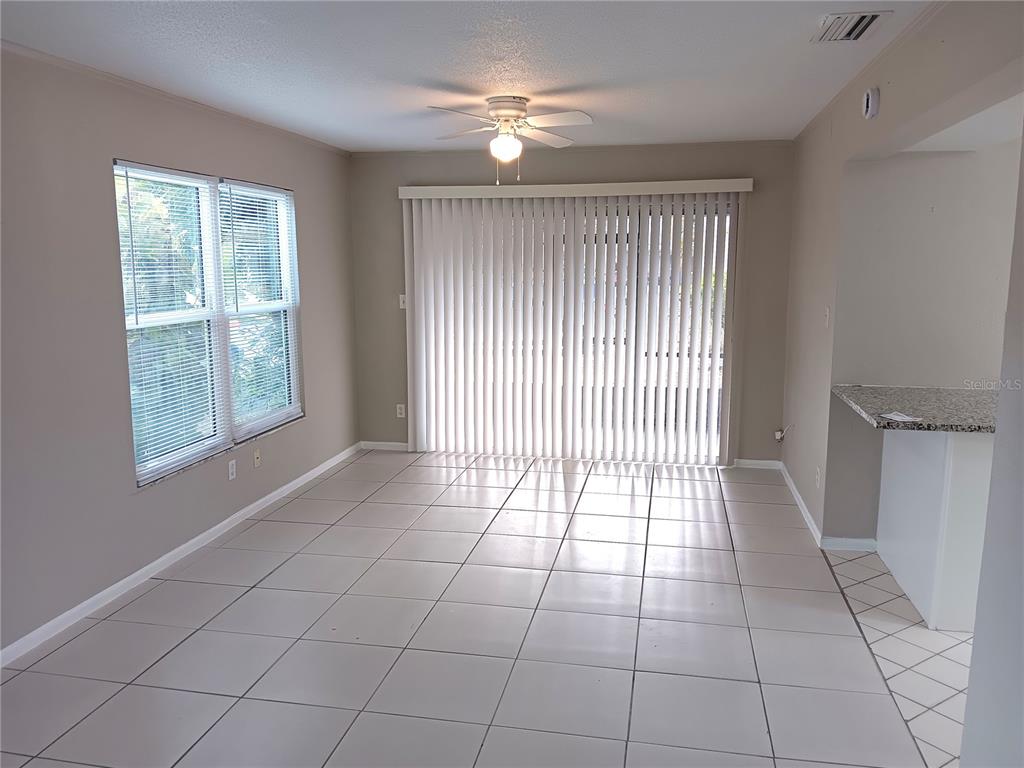 3756 Amherst Way, Unit 1 Sarasota, FL 34232 - Photo 5 of 14 a view of an empty room with a window