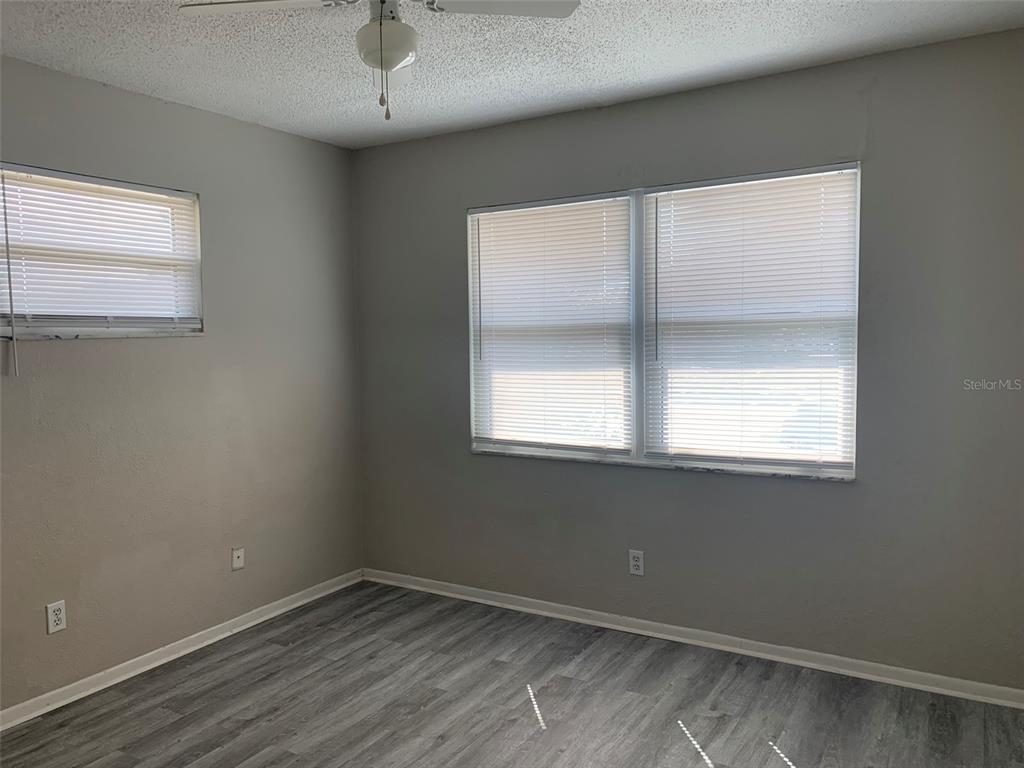 3756 Amherst Way, Unit 1 Sarasota, FL 34232 - Photo 7 of 14 an empty room with a window