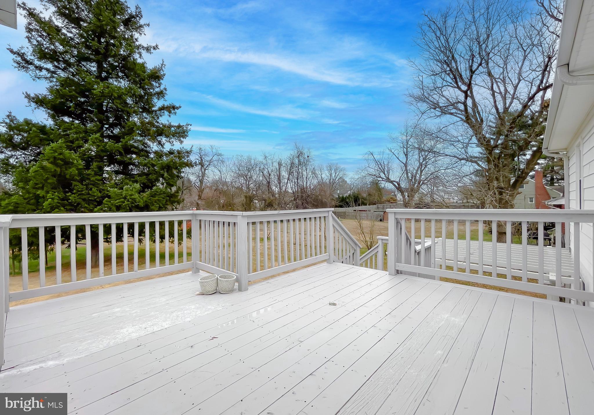 7004 Vismanco Lane Clinton, MD 20735 - Photo 14 of 63 a view of deck with wooden floor and fence