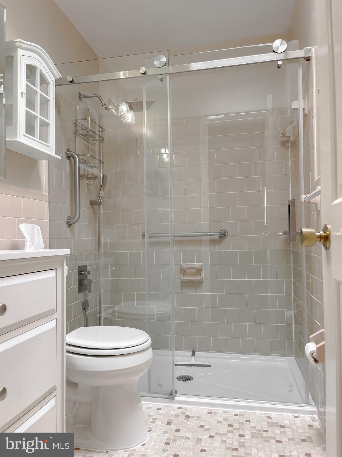 7004 Vismanco Lane Clinton, MD 20735 - Photo 28 of 63 a bathroom with a shower a toilet and a shower