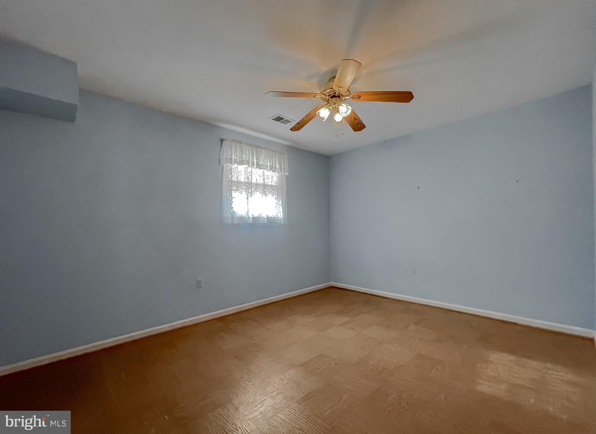 7004 Vismanco Lane Clinton, MD 20735 - Photo 34 of 63 an empty room with windows and fan