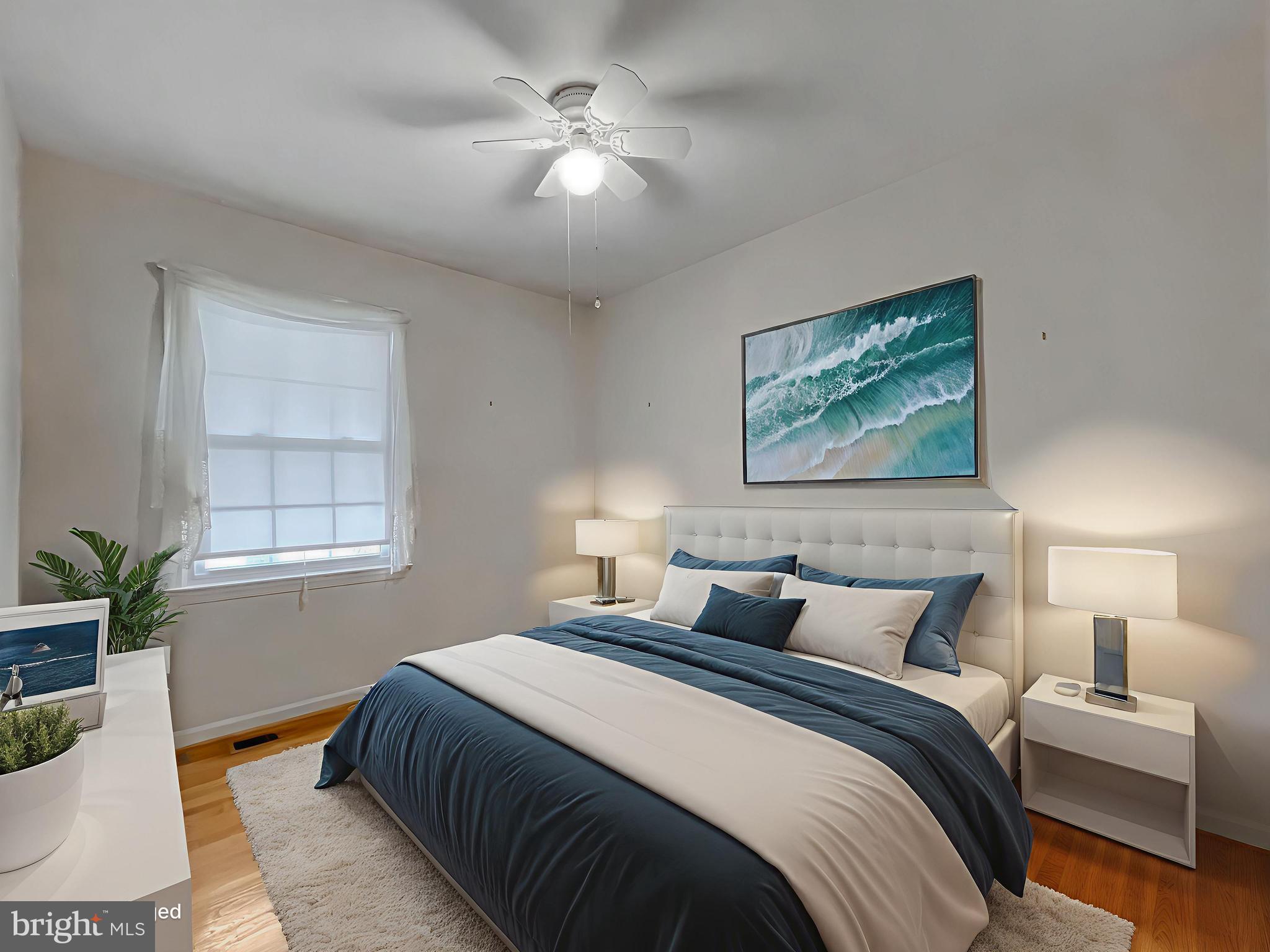 7004 Vismanco Lane Clinton, MD 20735 - Photo 38 of 63 a bedroom with a large bed and a chandelier