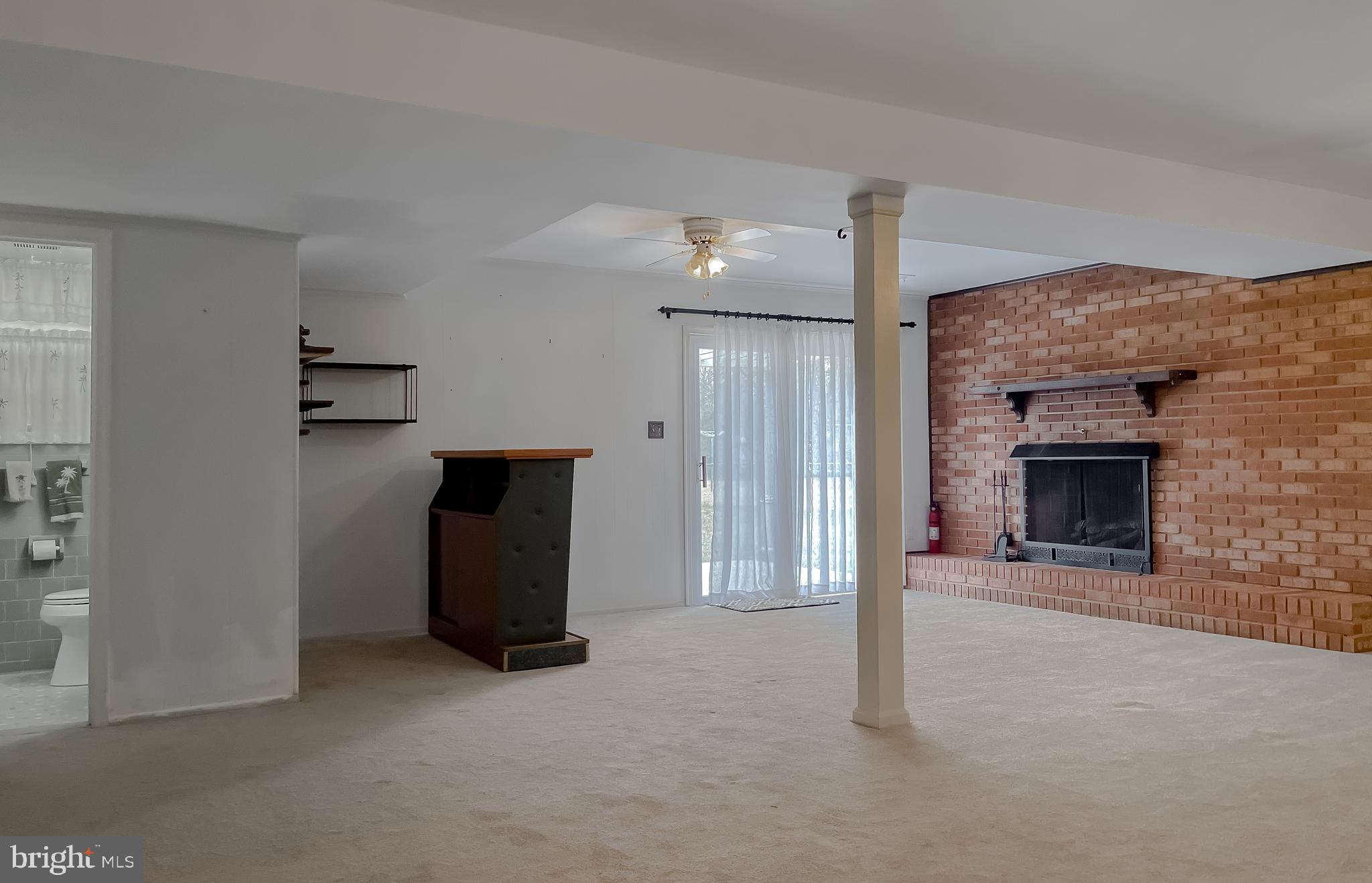 7004 Vismanco Lane Clinton, MD 20735 - Photo 43 of 63 a view of a livingroom with a fireplace