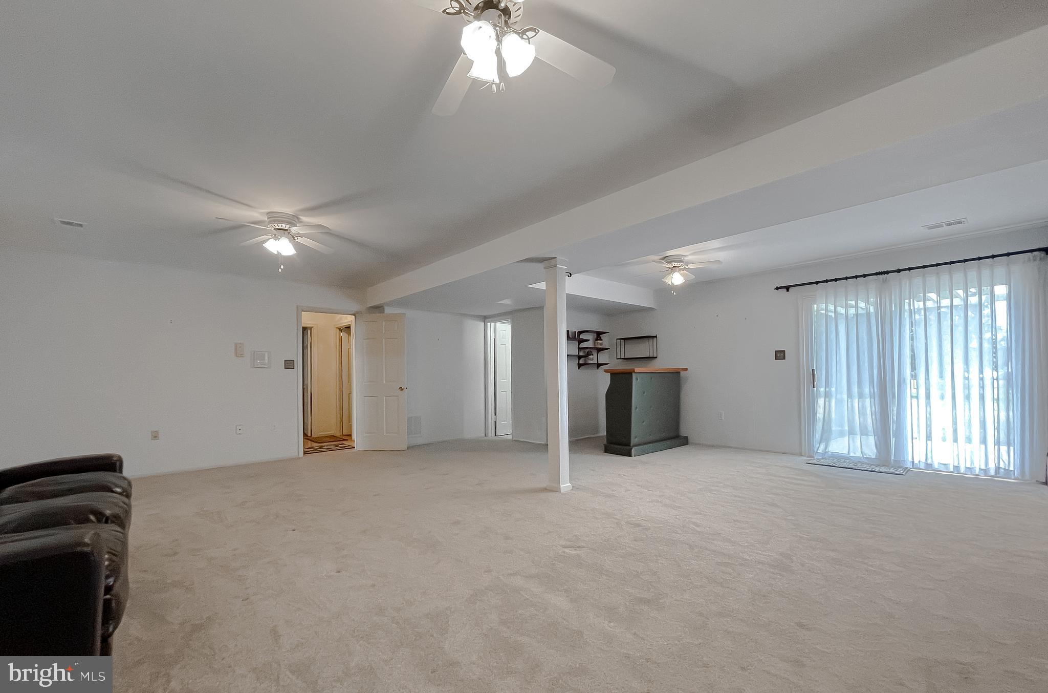 7004 Vismanco Lane Clinton, MD 20735 - Photo 47 of 63 a view of an empty room with a window