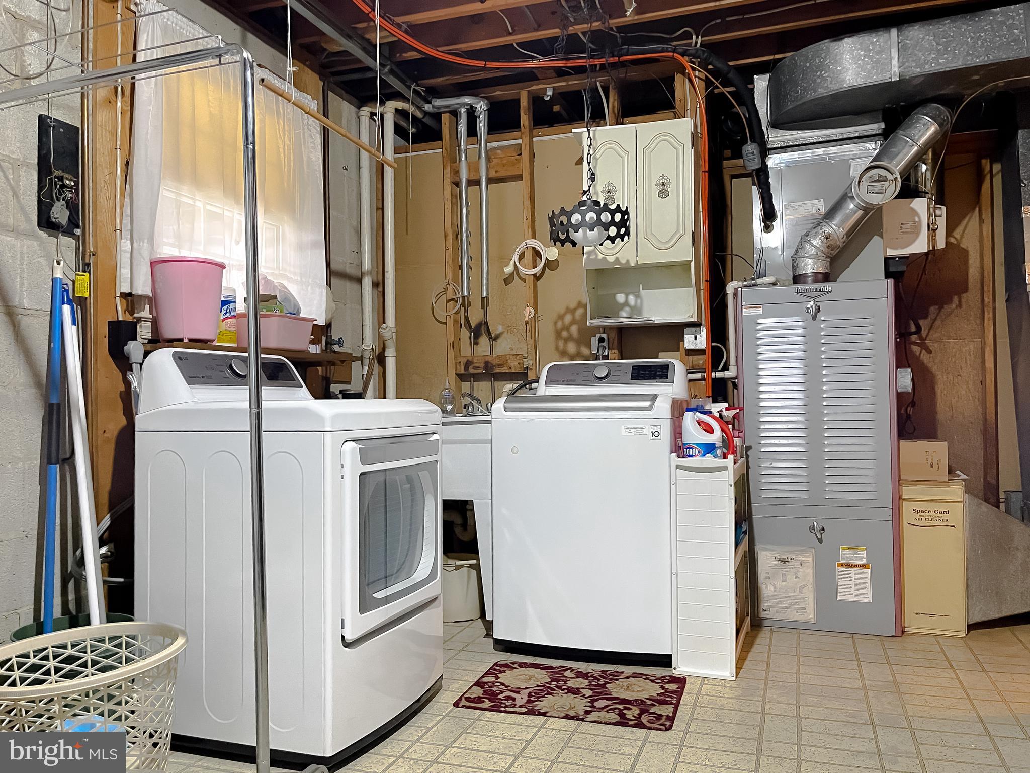 7004 Vismanco Lane Clinton, MD 20735 - Photo 56 of 63 a utility room with dryer and washer