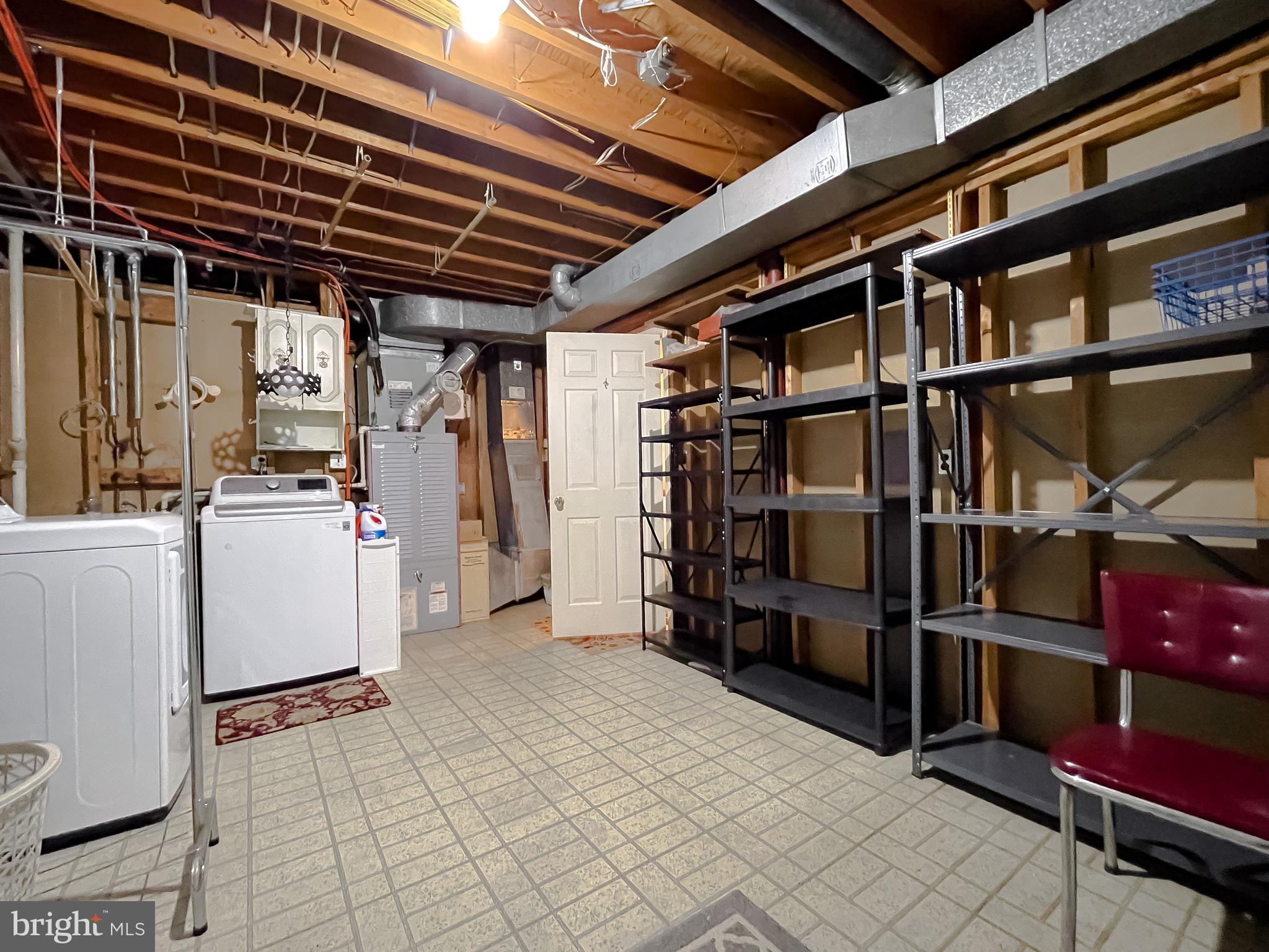7004 Vismanco Lane Clinton, MD 20735 - Photo 57 of 63 a view of storage and utility room