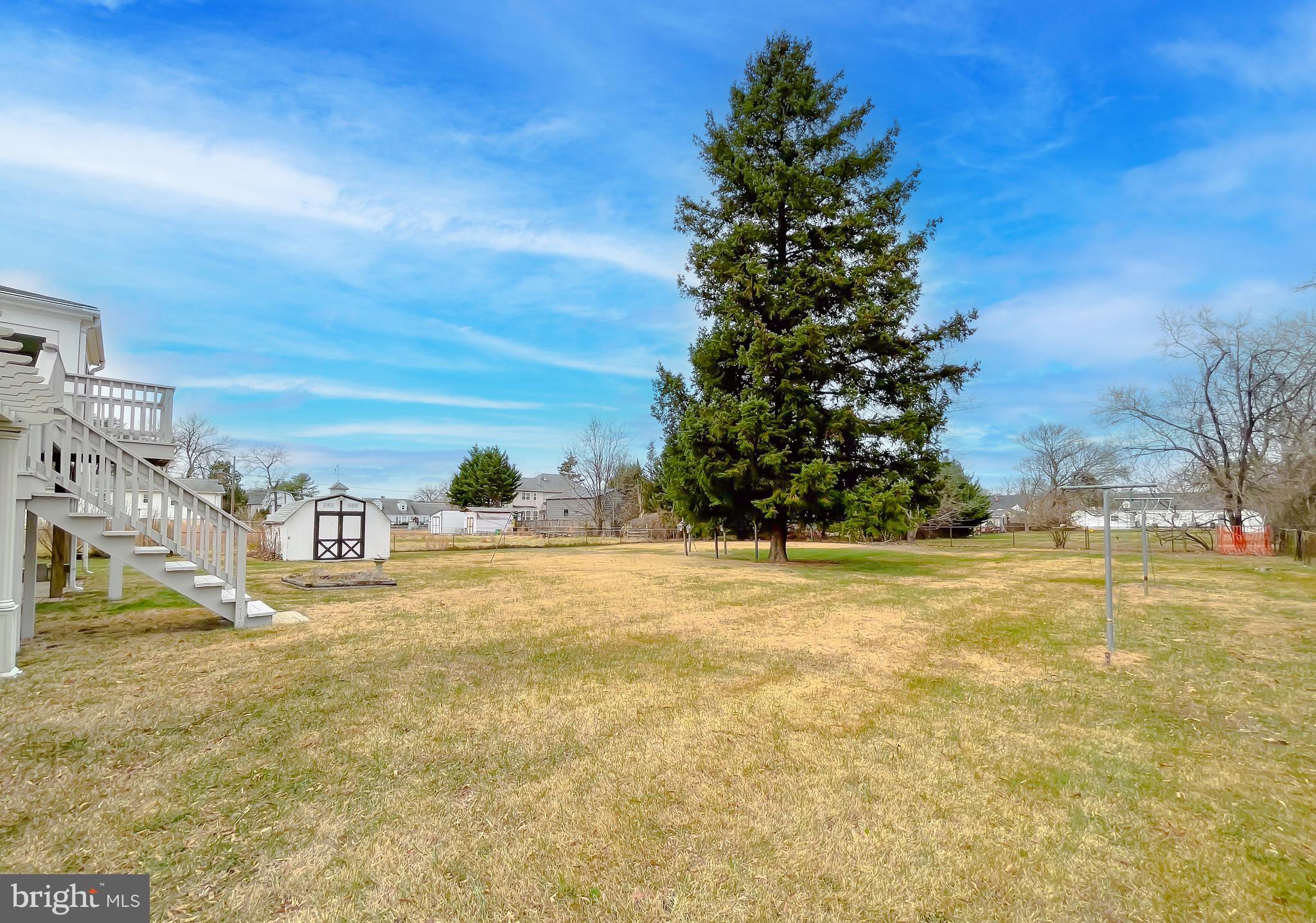 7004 Vismanco Lane Clinton, MD 20735 - Photo 60 of 63 a view of a yard with an ocean