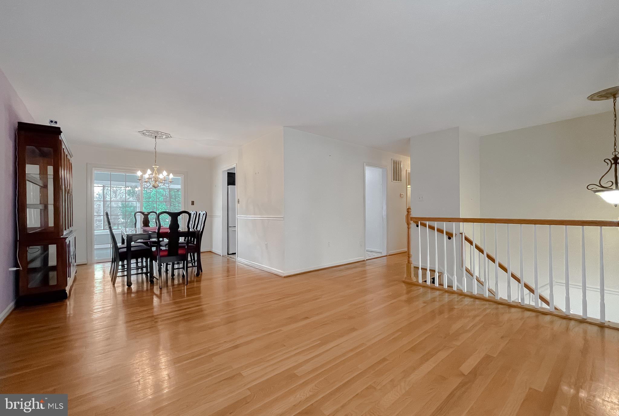 7004 Vismanco Lane Clinton, MD 20735 - Photo 8 of 63 a view of dining room with furniture and wooden floor