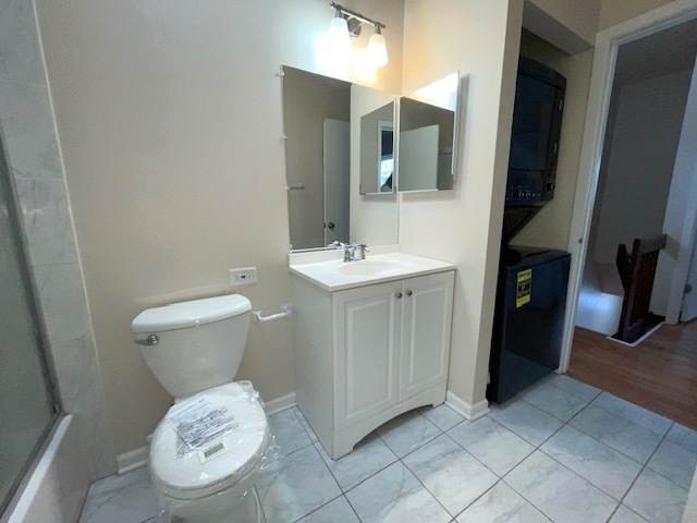1267 Maroon Drive Elgin, IL 60120 - Photo 16 of 23 a bathroom with a sink and a toilet