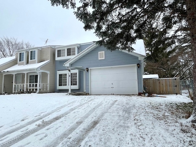 1267 Maroon Drive Elgin, IL 60120 - Photo 23 of 23 a front view of a house with a yard