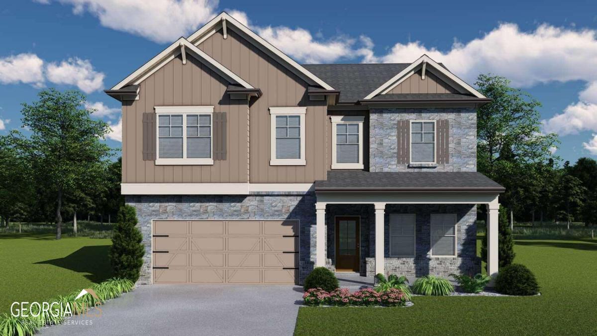 a front view of a house with garden