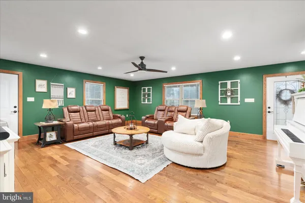 a view of a dining room with furniture and window