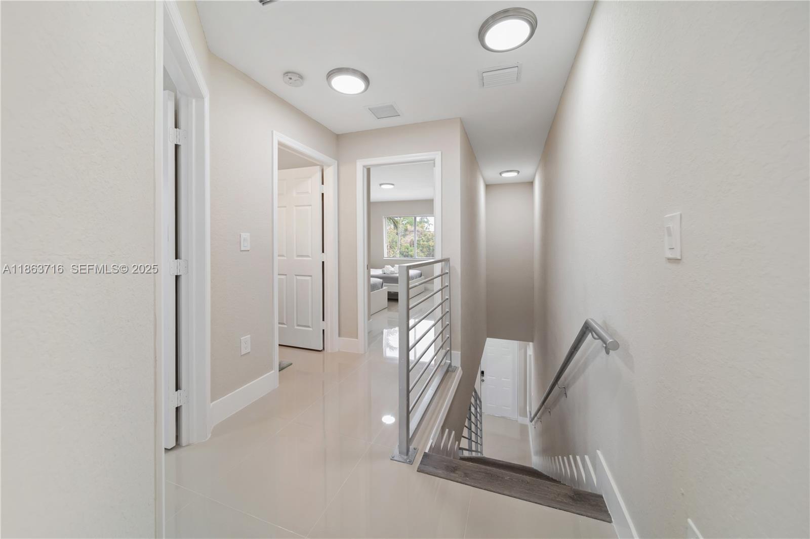 1183 Northeast 111th Street, Unit 1183 Miami, FL 33161 - Photo 11 of 20 wooden floor in a gallery