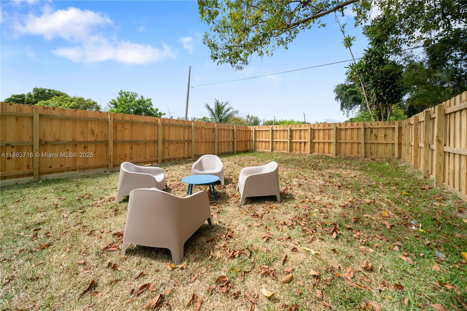 1183 Northeast 111th Street, Unit 1183 Miami, FL 33161 - Photo 20 of 20 a view of a backyard with sitting area