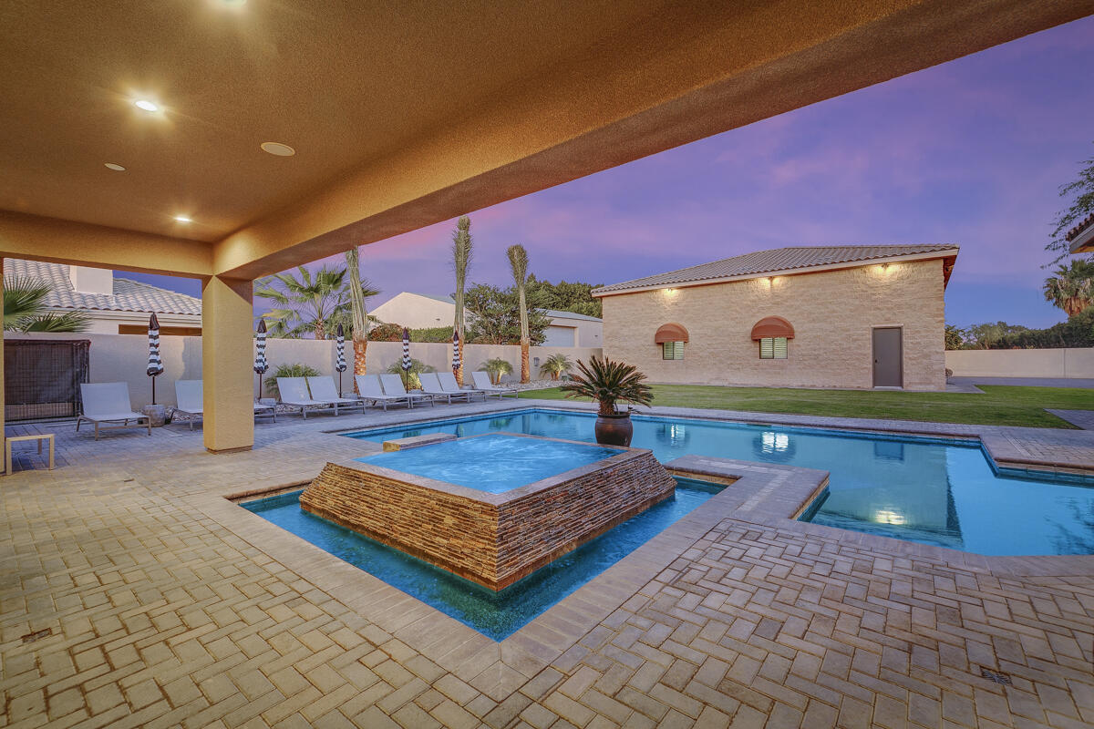41370 Sparkey Way Bermuda Dunes, CA 92203 - Photo 11 of 82 a living room with furniture a pool table and a fireplace