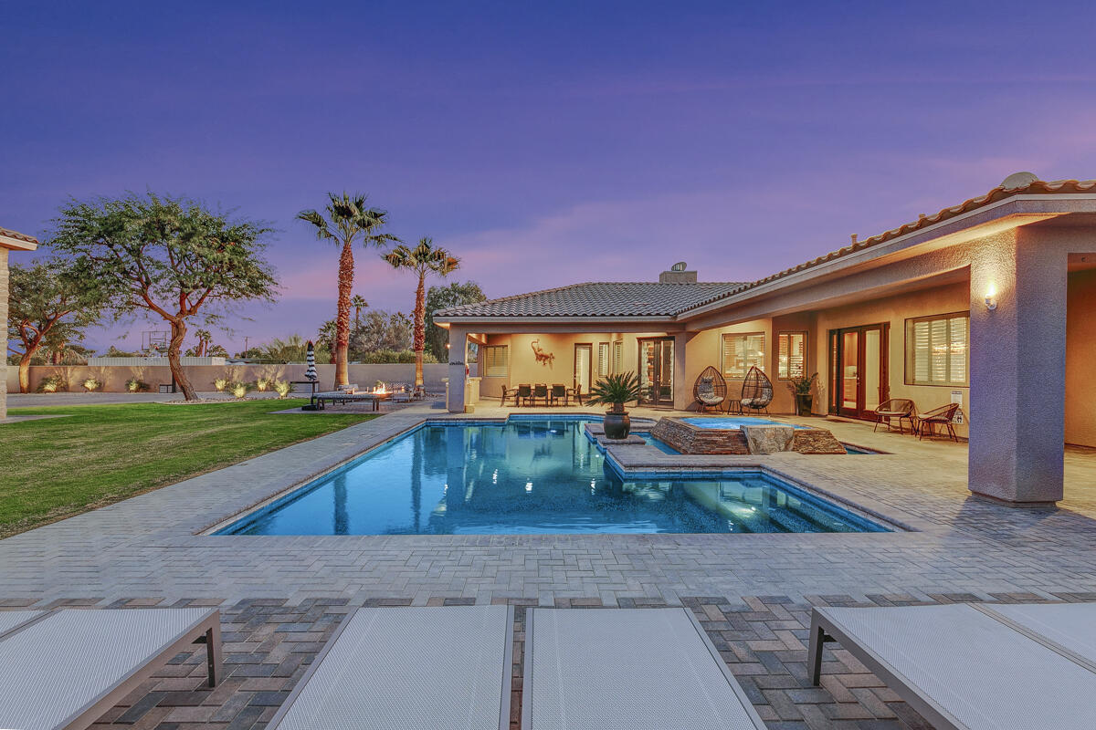 41370 Sparkey Way Bermuda Dunes, CA 92203 - Photo 15 of 82 a front view of house with yard and seating area