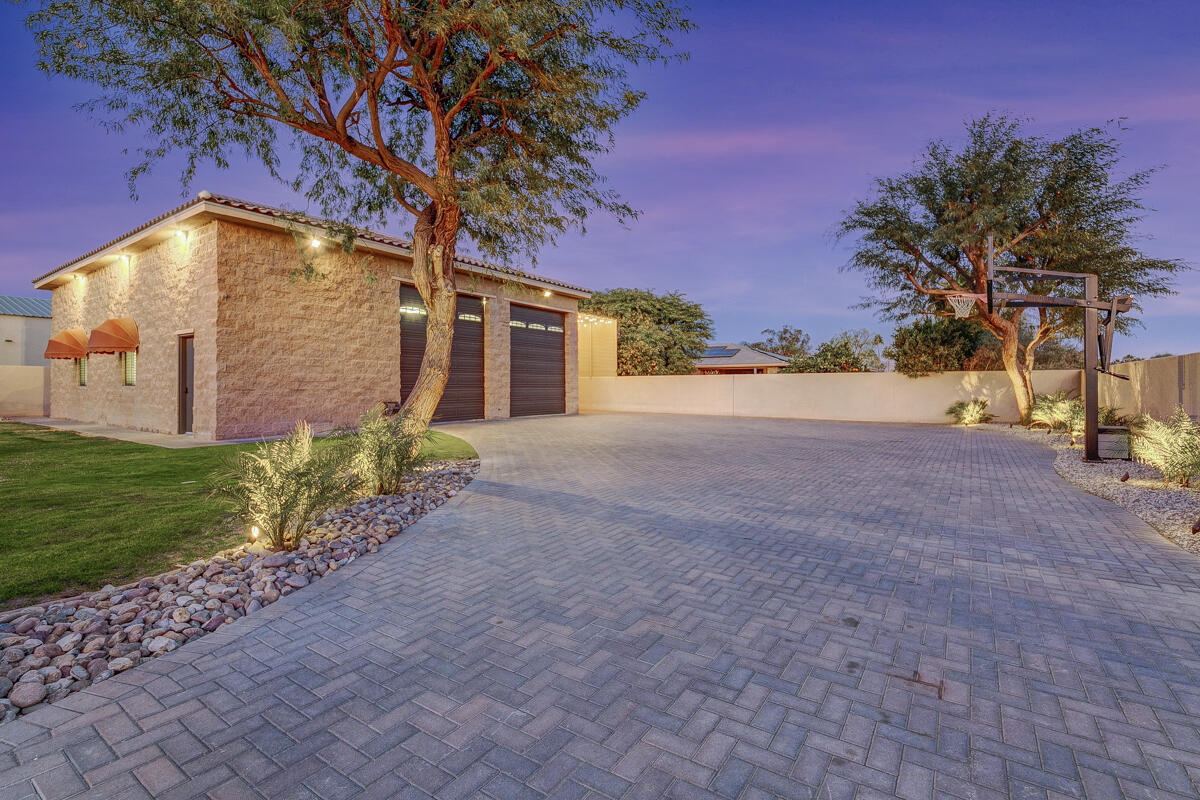 41370 Sparkey Way Bermuda Dunes, CA 92203 - Photo 24 of 82 a front view of a house with a yard and garage