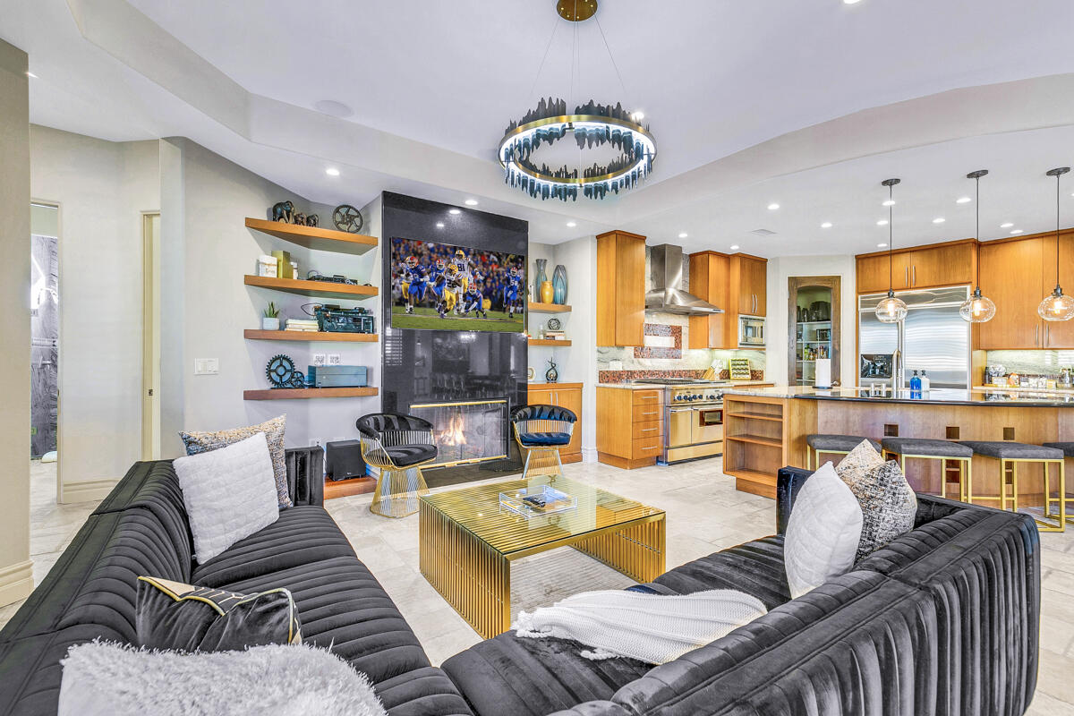 41370 Sparkey Way Bermuda Dunes, CA 92203 - Photo 39 of 82 a living room with furniture kitchen and a large window