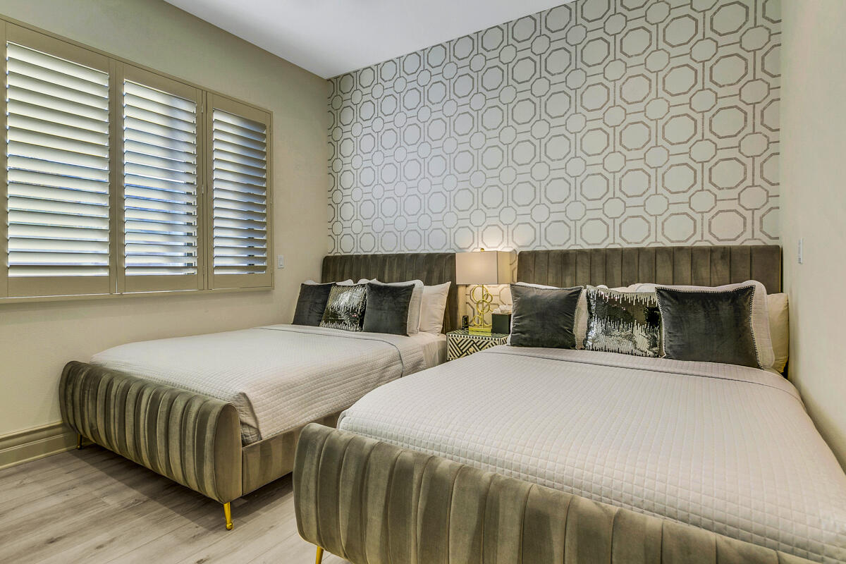 41370 Sparkey Way Bermuda Dunes, CA 92203 - Photo 42 of 82 a bedroom with two beds and a couch