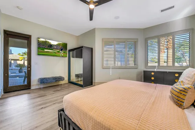 a view of a chairs and table in a patio