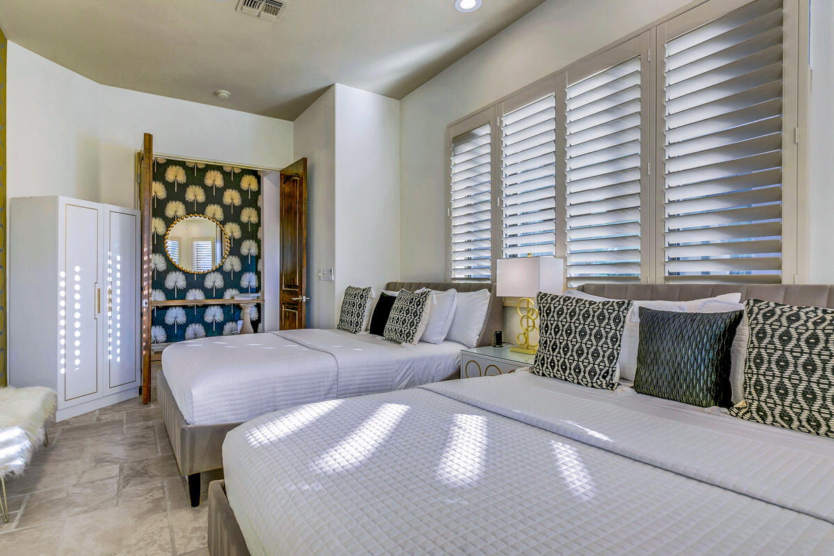 41370 Sparkey Way Bermuda Dunes, CA 92203 - Photo 45 of 82 a bedroom with furniture and a large window