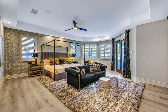 a dinning table and chairs in a room