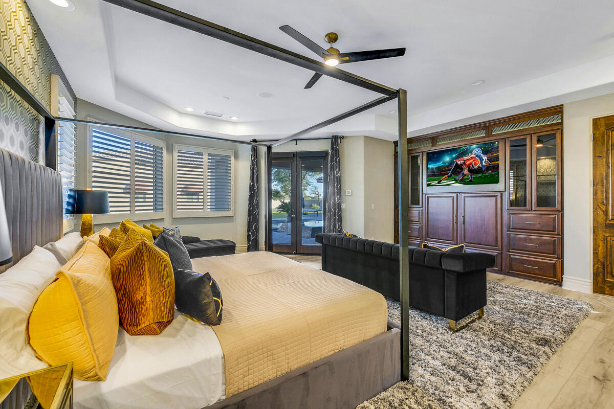 41370 Sparkey Way Bermuda Dunes, CA 92203 - Photo 48 of 82 a bedroom with a bed and wooden floor