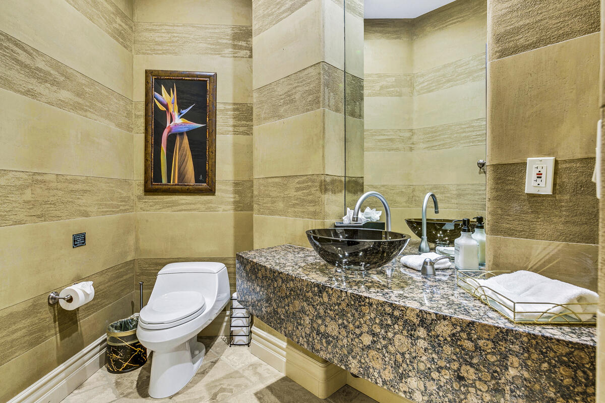 41370 Sparkey Way Bermuda Dunes, CA 92203 - Photo 56 of 82 a bathroom with a toilet sink and mirror