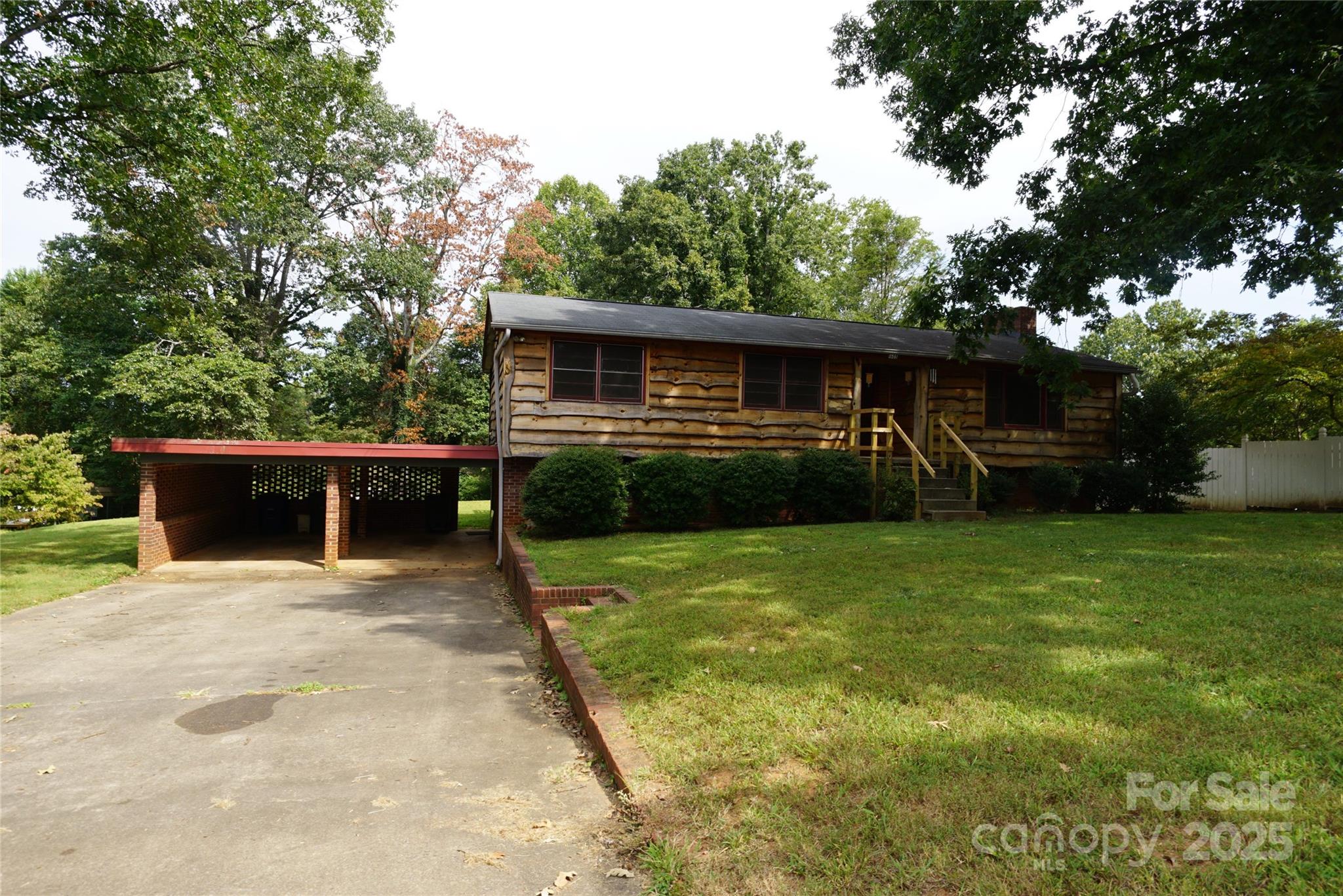 1605 3rd Street Northeast Conover, NC 28613 - Photo 2 of 19 a view of a backyard with furniture