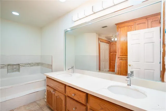 a bathroom with a sink and a bathtub