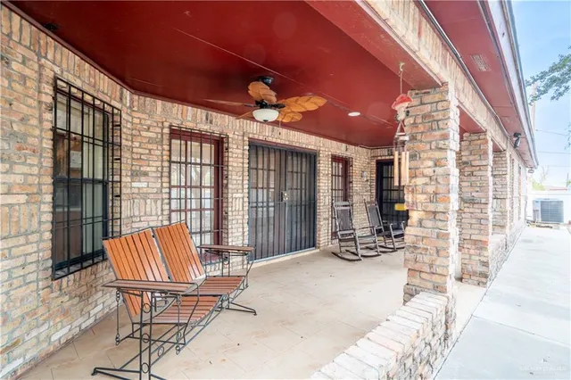 a view of balcony with two chairs and a couch