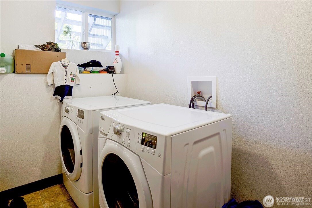 2357 Northwest 65th Street Seattle, WA 98117 - Photo 14 of 20 a utility room with dryer and washer