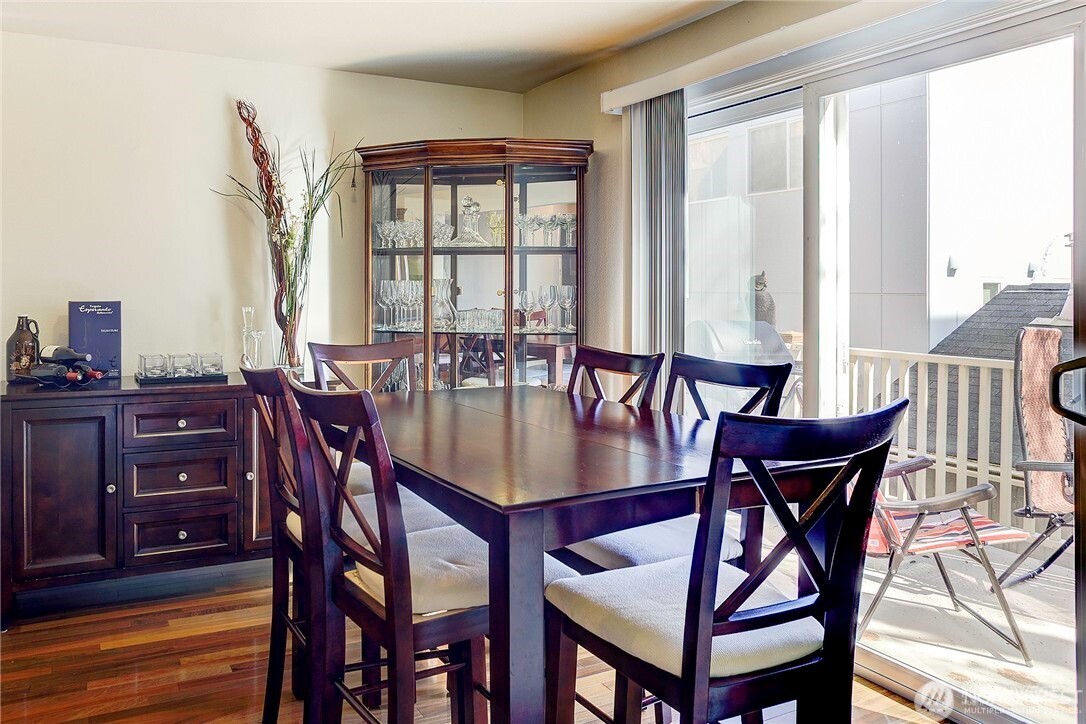 2357 Northwest 65th Street Seattle, WA 98117 - Photo 3 of 20 a view of a dining room with furniture window and outside view