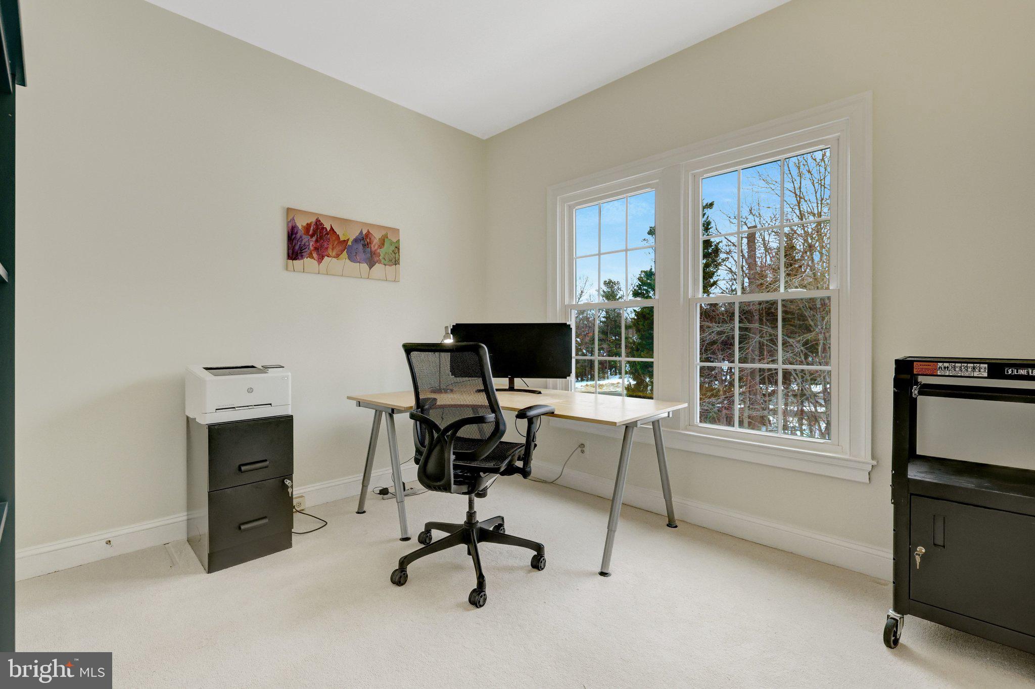 1309 Sundial Drive Reston, VA 20194 - Photo 24 of 45 a view of a workspace with furniture and a window