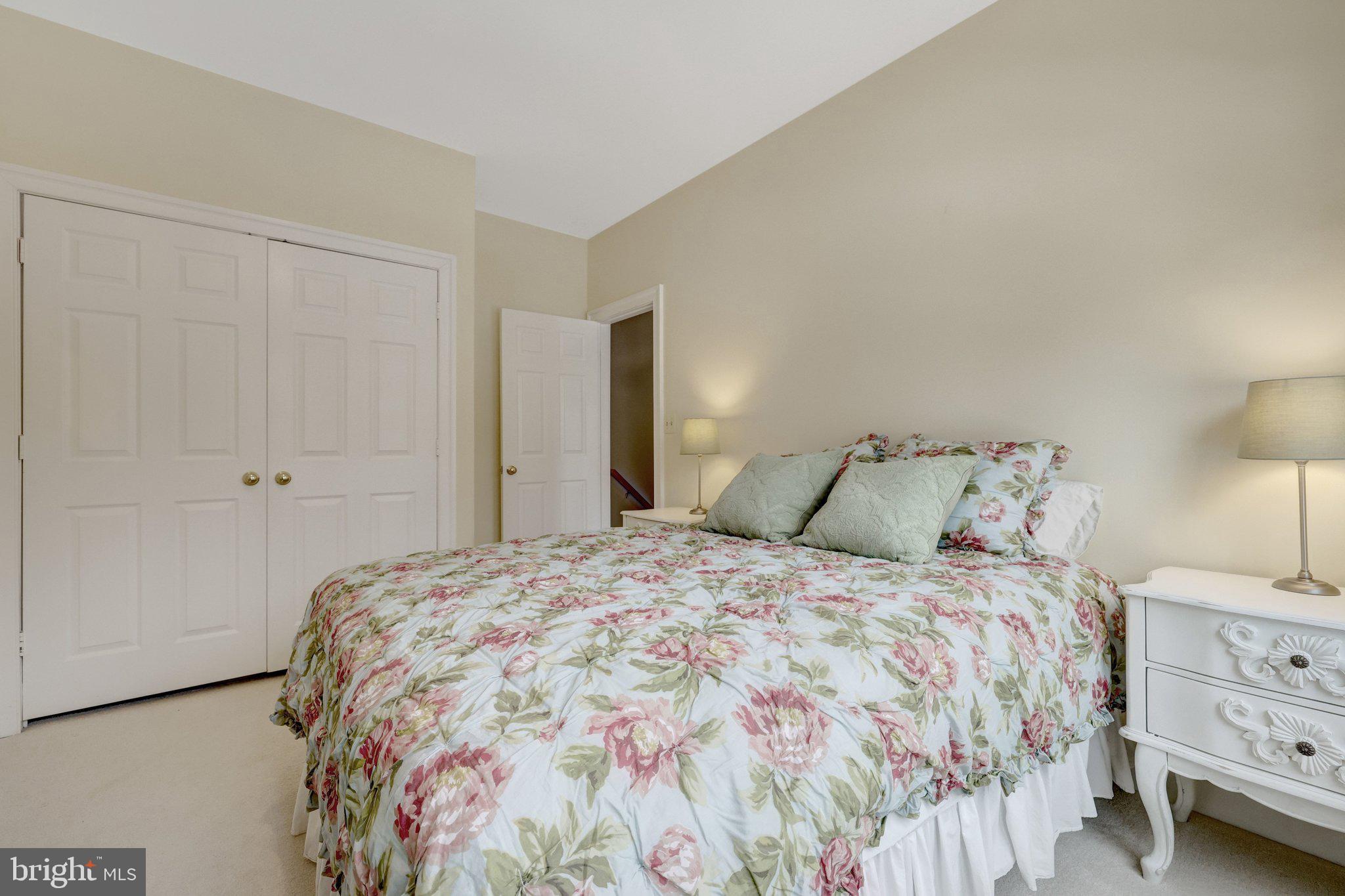 1309 Sundial Drive Reston, VA 20194 - Photo 27 of 45 a large bed sitting in a bedroom and dresser