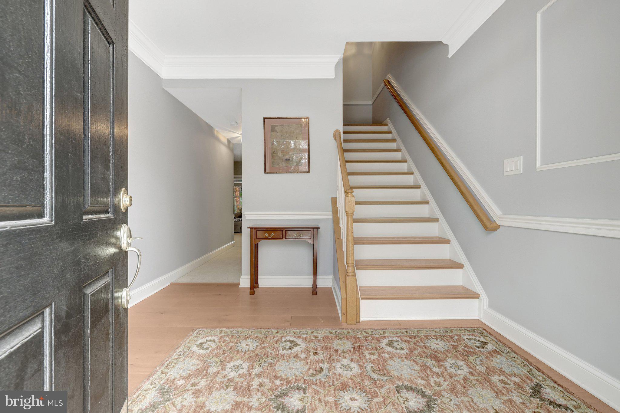 1309 Sundial Drive Reston, VA 20194 - Photo 3 of 45 a view of entryway and hall with wooden floor