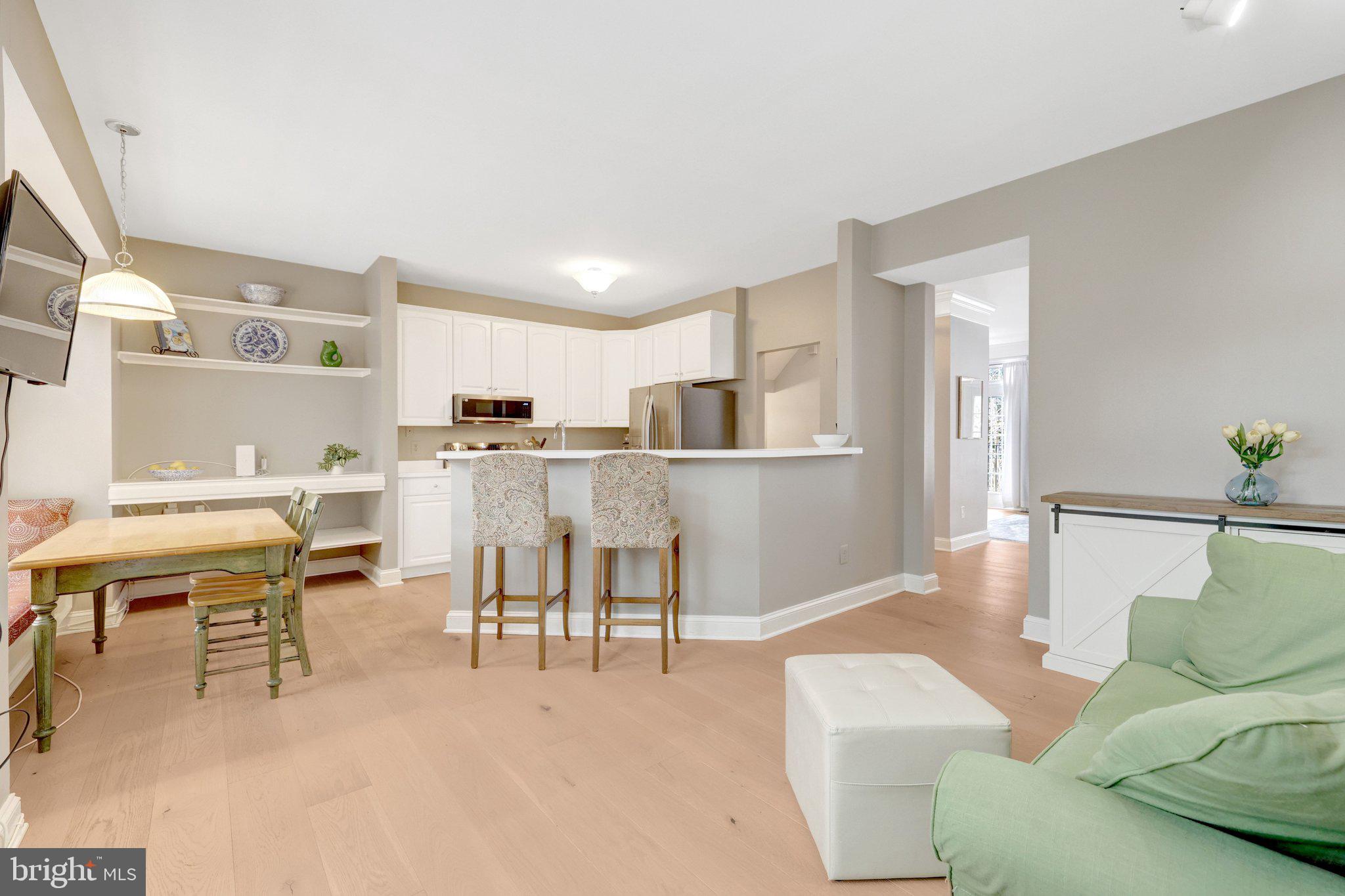 1309 Sundial Drive Reston, VA 20194 - Photo 10 of 45 a living room with furniture and kitchen view