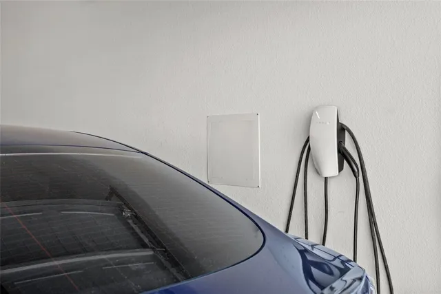 a view of staircase with white walls