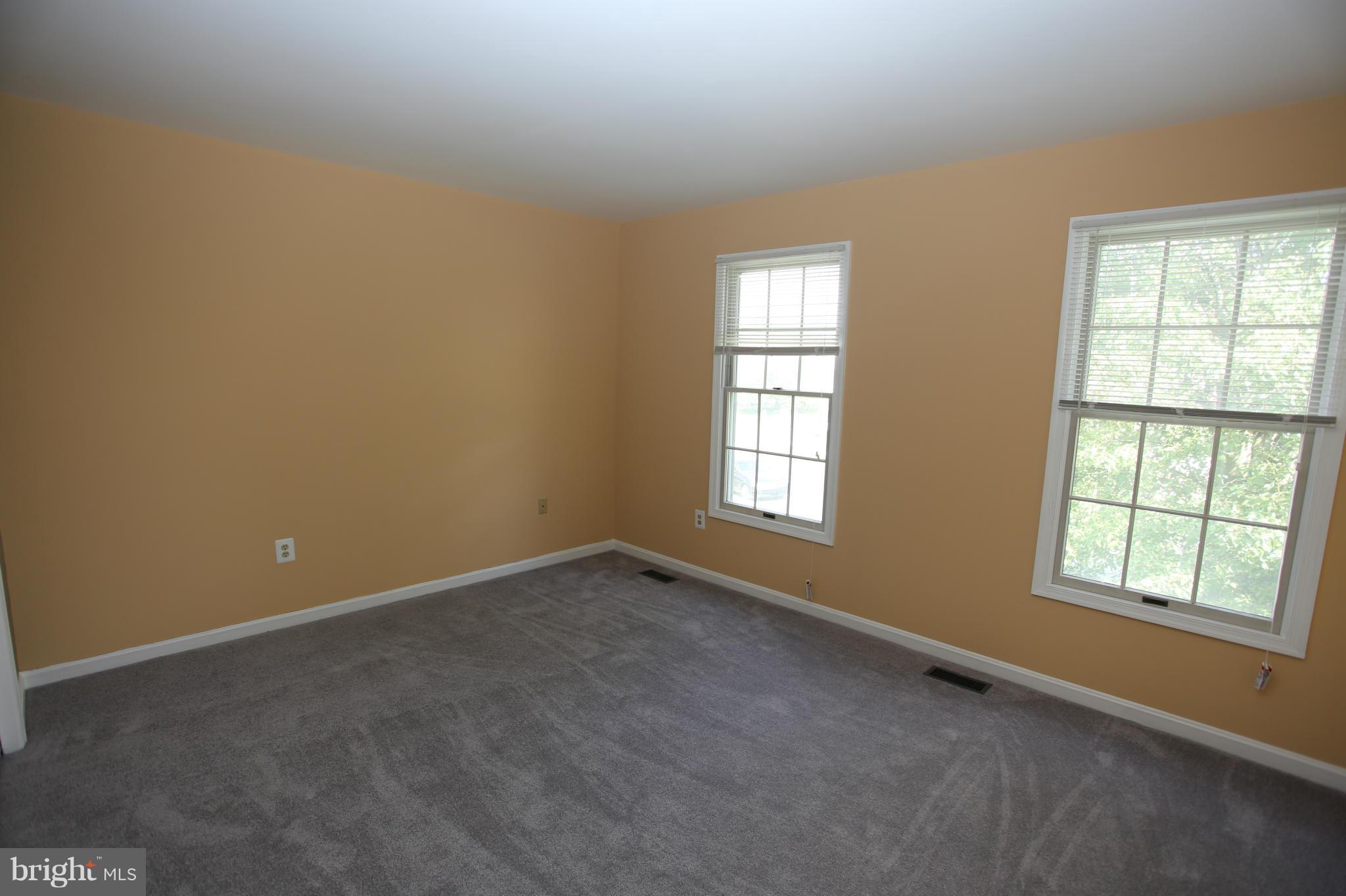 703 Monarch Ridge Road Frederick, MD 21703 - Photo 19 of 30 an empty room with windows