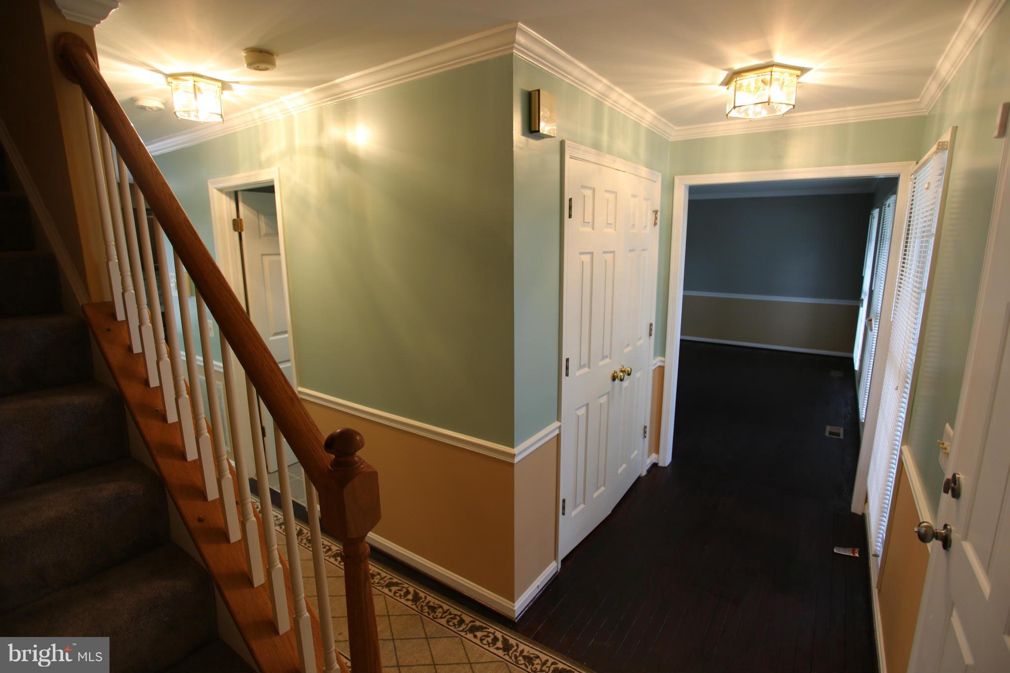 703 Monarch Ridge Road Frederick, MD 21703 - Photo 3 of 30 a view of a hallway with the entryway