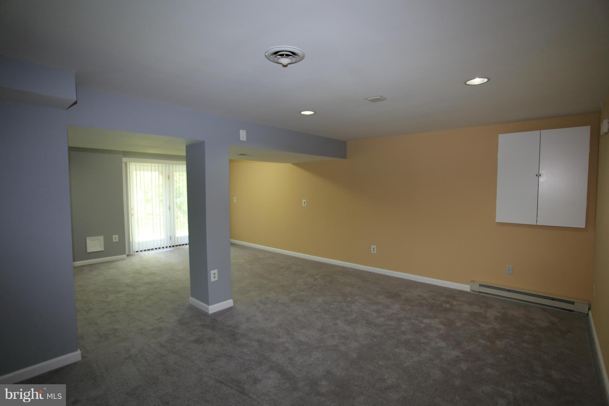 703 Monarch Ridge Road Frederick, MD 21703 - Photo 23 of 30 a view of an empty room with a window